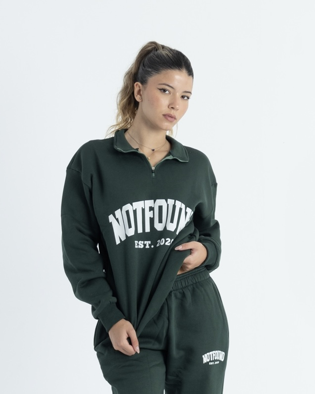 green zip-up sweatshirt