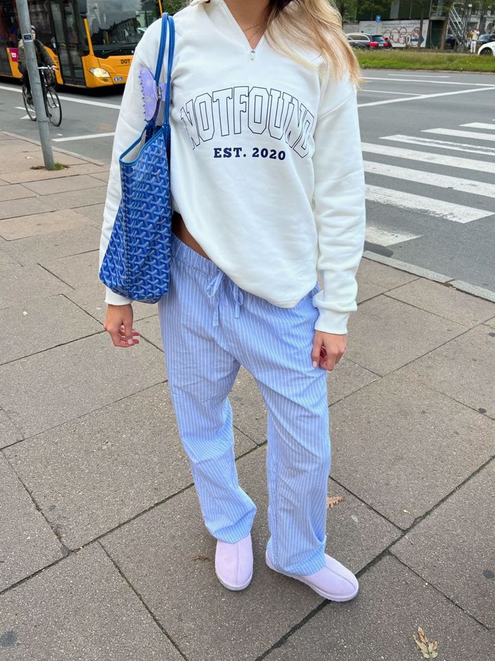 white zip-up sweatshirt